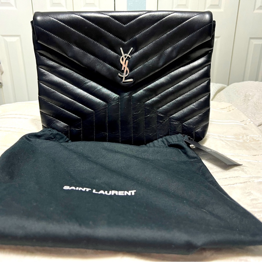 Authentic YSL large clutch.